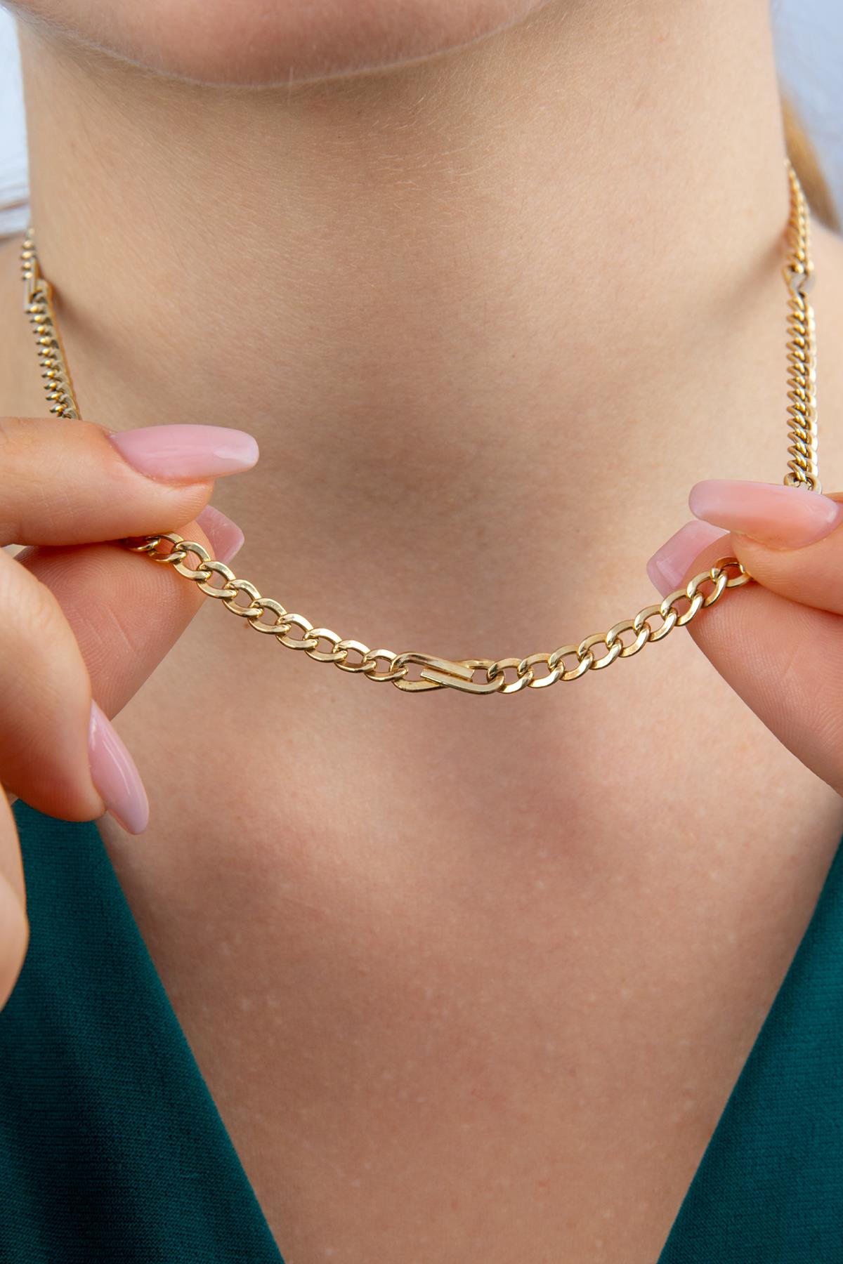 14K Gold Bow Tie Cuban Link Chain 0.153 inch