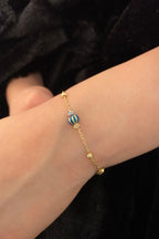 14ct Gold Dorica Ball With Blue Object Bracelet