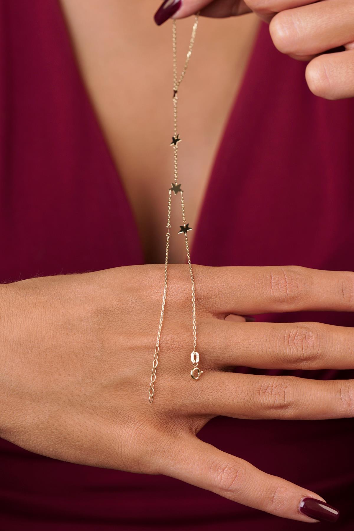 14ct Gold Row of Stars Hand Chain